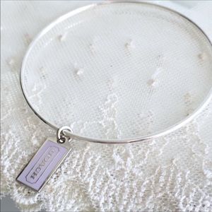 FINAL PRICE! Coach Pale Lavender Hangtag Bracelet